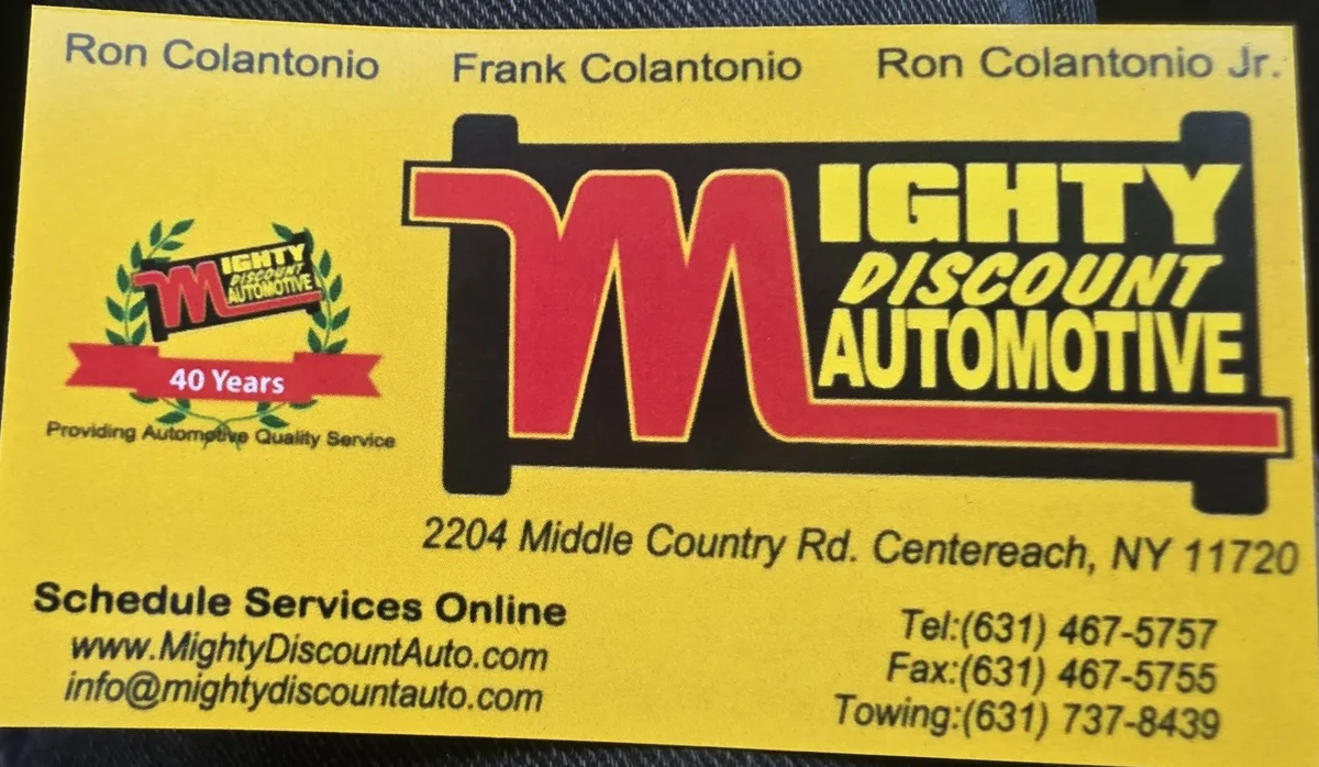 Mighty Discount Automotive's business card